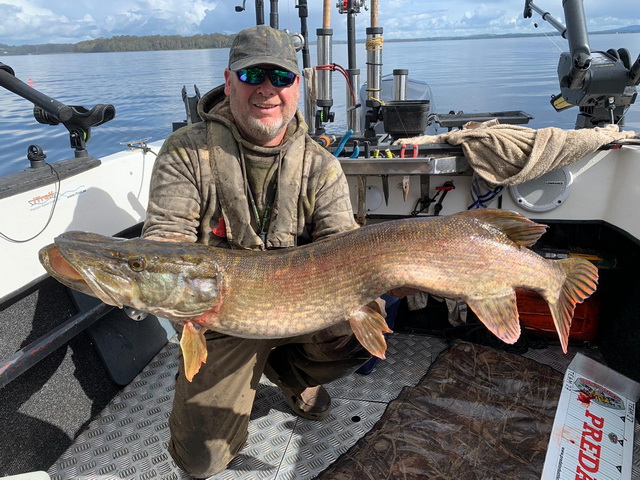 Al Rawlings and Stephen Gibbons with a great pike.